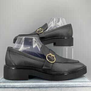 Stuart Weitzman Black Loafers with Gold Buckle
